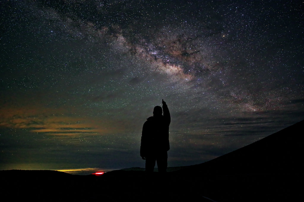 Milky Way astrophotography from Mauna Kea with human silhouette pointing toward galactic core fine art space wall art